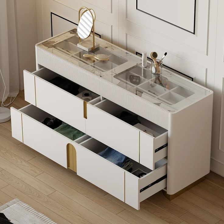 a bathroom vanity with two sinks and drawers in the same color as it appears to be white