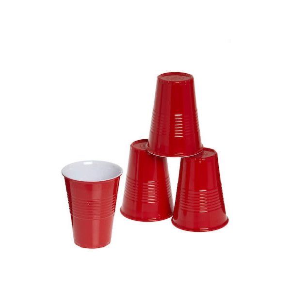 red plastic cups are stacked on top of each other, with one cup in the middle