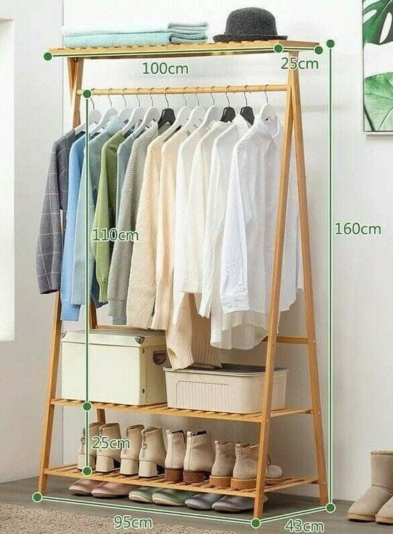 an image of a clothes rack with shoes and shirts on it, measurements for the size