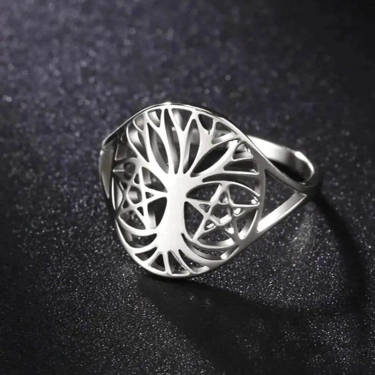 🌳 Looking for a unique and meaningful piece of jewelry? Check out our Pagan Tree of Life Ring! 🌿 Made from high-quality stainless steel, this ring won't rust or cause allergies. It's also resistant to acid and alkali, ensuring its durability for years to come. Plus, the color won't fade or deform over time. Get yours today and embrace the power and beauty of the Tree of Life. 🌺 Silver Titanium Promise Jewelry, Hypoallergenic White Gold Metal Ring, Hypoallergenic White Gold Ring, Titanium Silver Ring Jewelry, Nickel-free Stainless Steel Promise Ring, Stainless Steel Open Ring For Promise Occasion, Stainless Steel Round Promise Jewelry, Hypoallergenic Silver Metal Ring, Minimalist Engraved Stainless Steel Rings