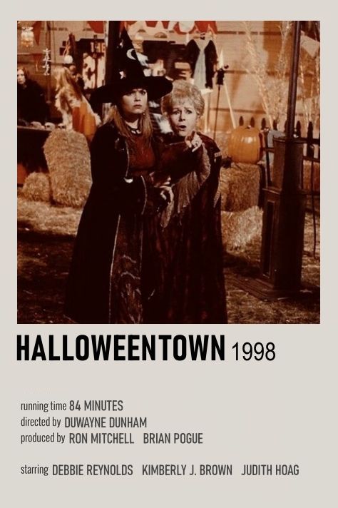 an old movie poster with two people dressed as witches and one is holding a pumpkin