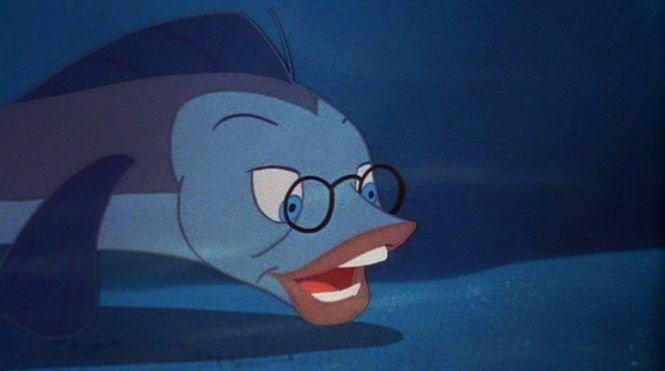 an animated fish wearing glasses and smiling for the camera