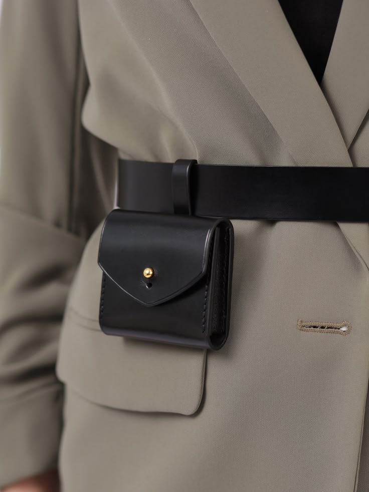 Made in a modern and minimalist aesthetic, the Micro Belt Bag is not only a fashion accessory but also a functional one. Although small, the stylish bag can hold your keys, coins or other small items. With its versatile design, the leather belt bag can be worn with a sporty jumpsuit for an edgy outfit or with a blazer for a chic, elegant look. Bag Size: Height- 7 cm, Width- 8 cm, Depth – 1.5 cm Waist belt width: 3 cm Adjustable using the buckle Designed to be fitted on the waist Diy Belt Bag, Waist Bags For Women, Waist Bag Leather, How To Tie Shoes, Edgy Outfit, Waist Purse, Collection Ideas, Soft Leather Handbags, Micro Bag