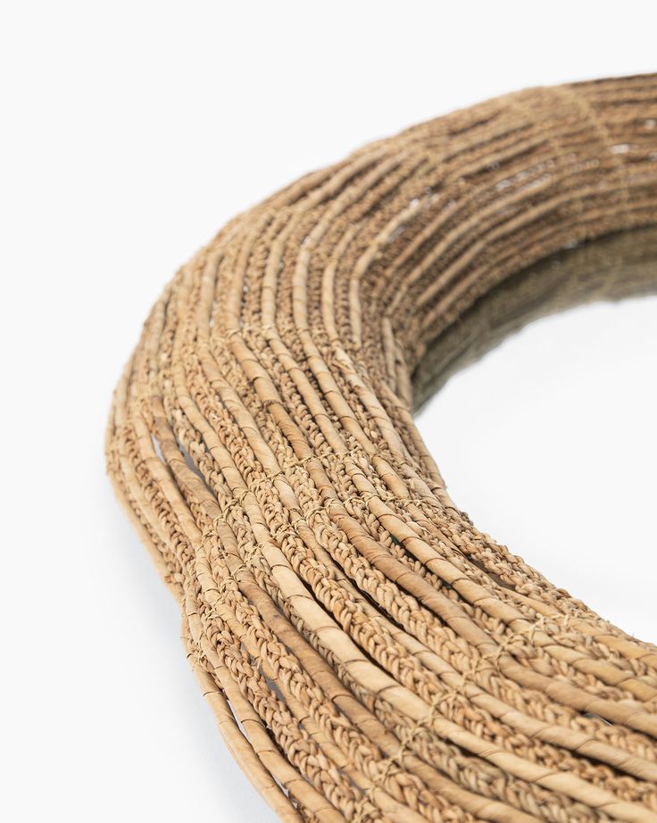 a close up of a piece of rope on a white background with no people around it