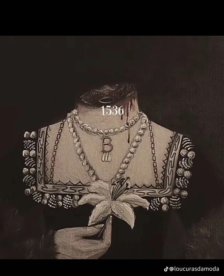 an old photo of a woman's dress with pearls and necklaces on it