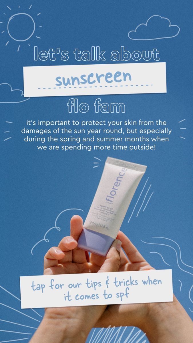 someone holding up a tube of sunscreen against a blue sky