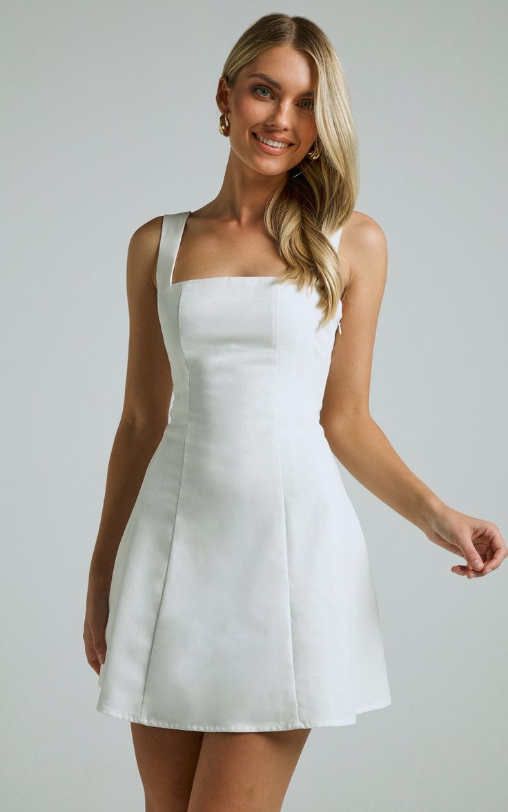 Graduation Dress Mid Size, Short White Dress Summer, Classy Mini Dress Chic, Classy White Mini Dress, Solid Mini Dress For Wedding, Solid Color Mini Dress For Wedding, White Mini Dress With Straight Neckline And Lining, Classic Summer Mini Dress With Fitted Bodice, Classic Mini Dress With Fitted Bodice For Summer