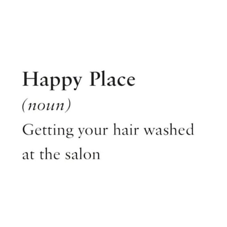 the words happy place are written in black and white on a white background, with an image of a woman's hair