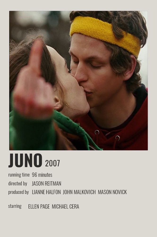 a man and woman kissing each other in front of a poster for the film juno