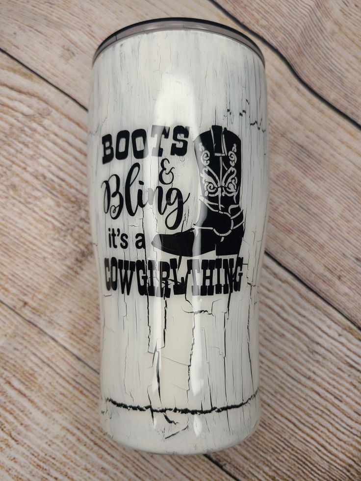 a white coffee mug with the words boos big and it's a cowboy thing on it