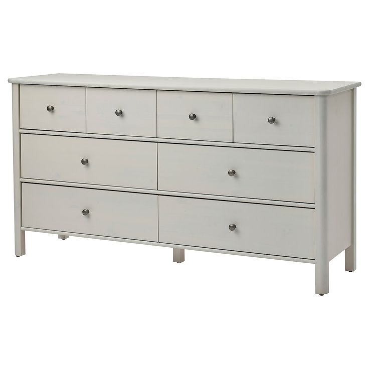 a large white dresser with six drawers