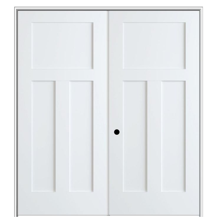 two white doors with black knobs on each side