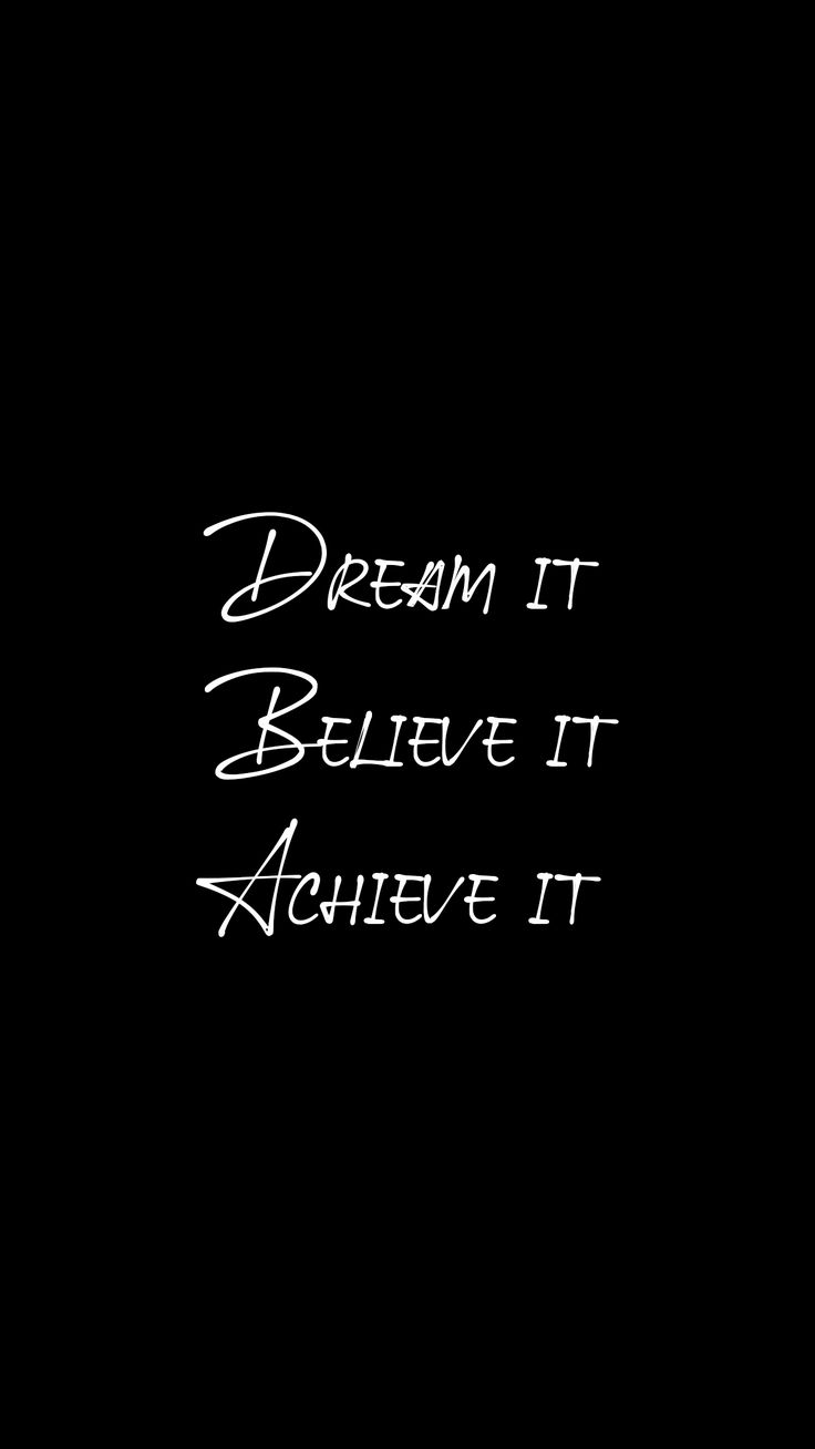 the words dream it believe it achieve it are written in white ink on a black background