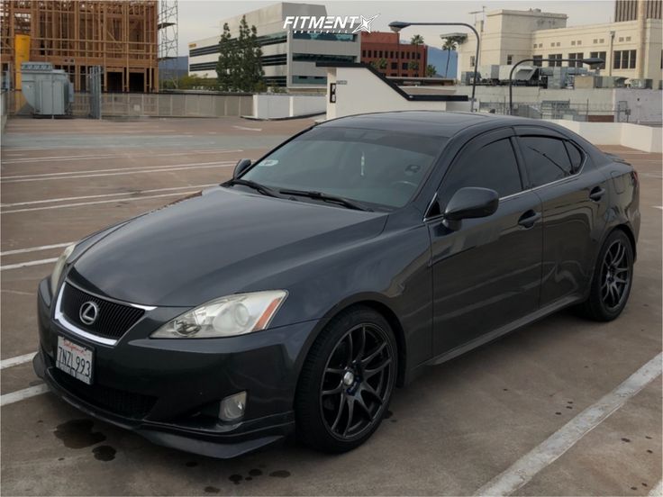 a black car parked in a parking lot