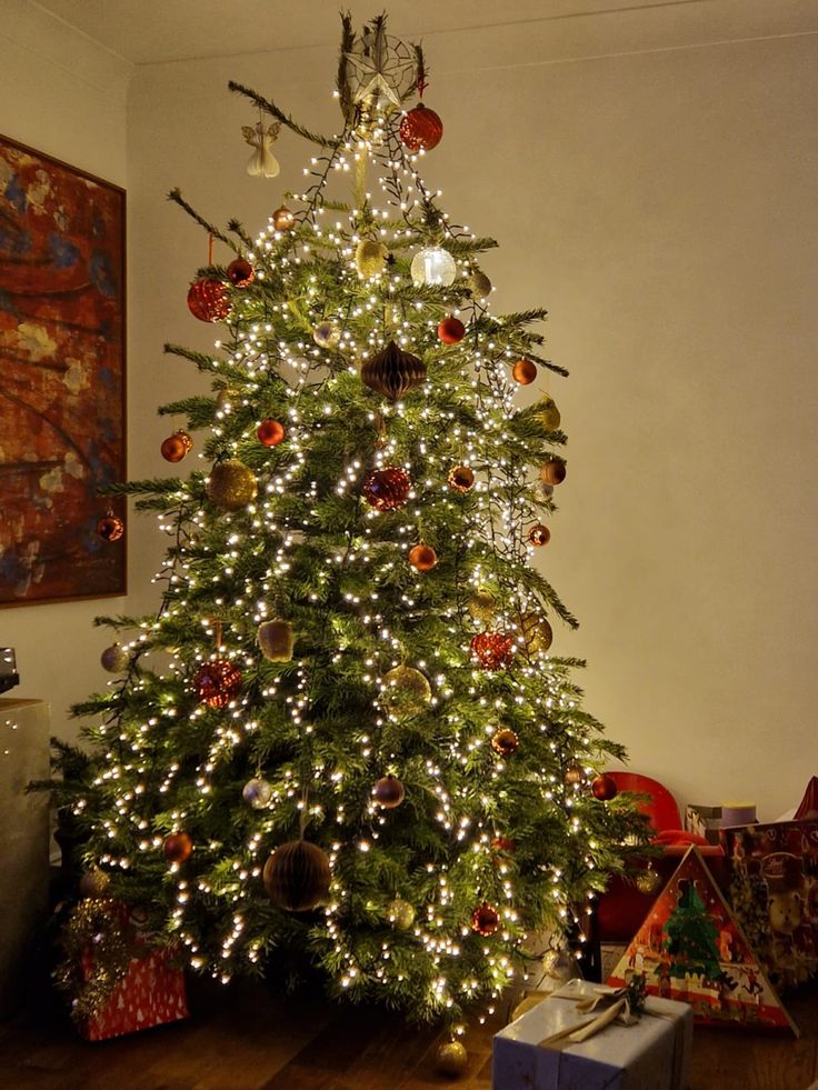 a decorated christmas tree in a living room