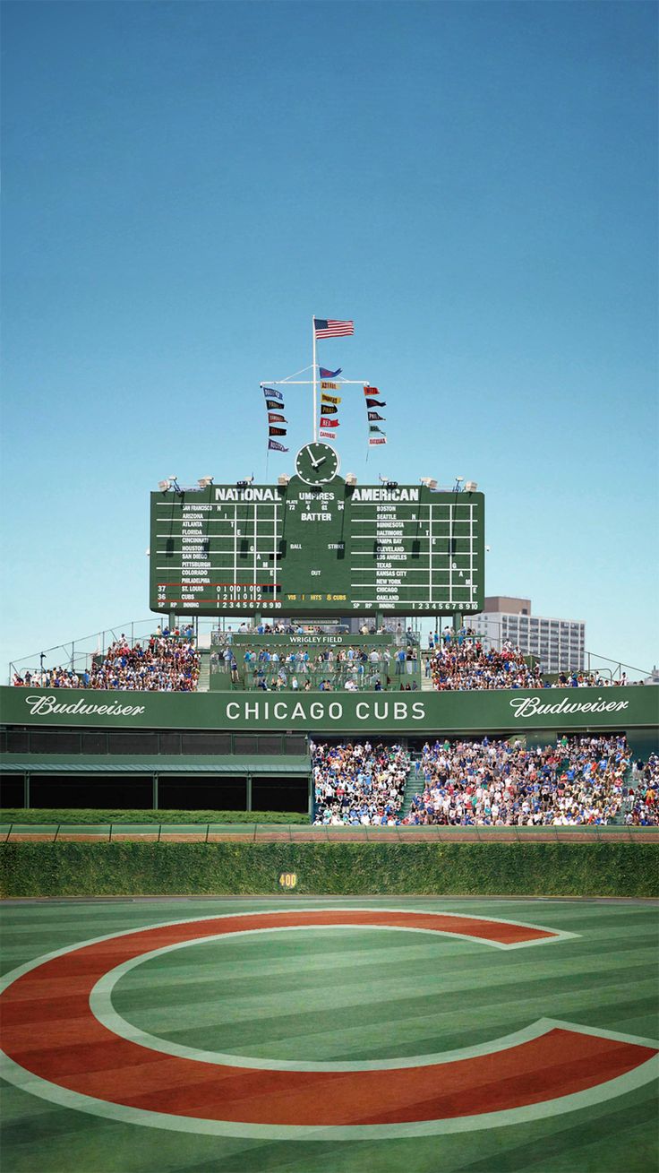 a baseball field with fans in the stands