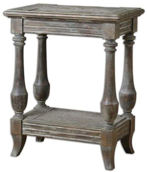 an old wooden table with two legs and a shelf on the bottom, sitting against a white background