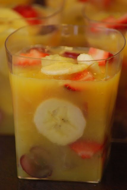 two glasses filled with different types of fruit