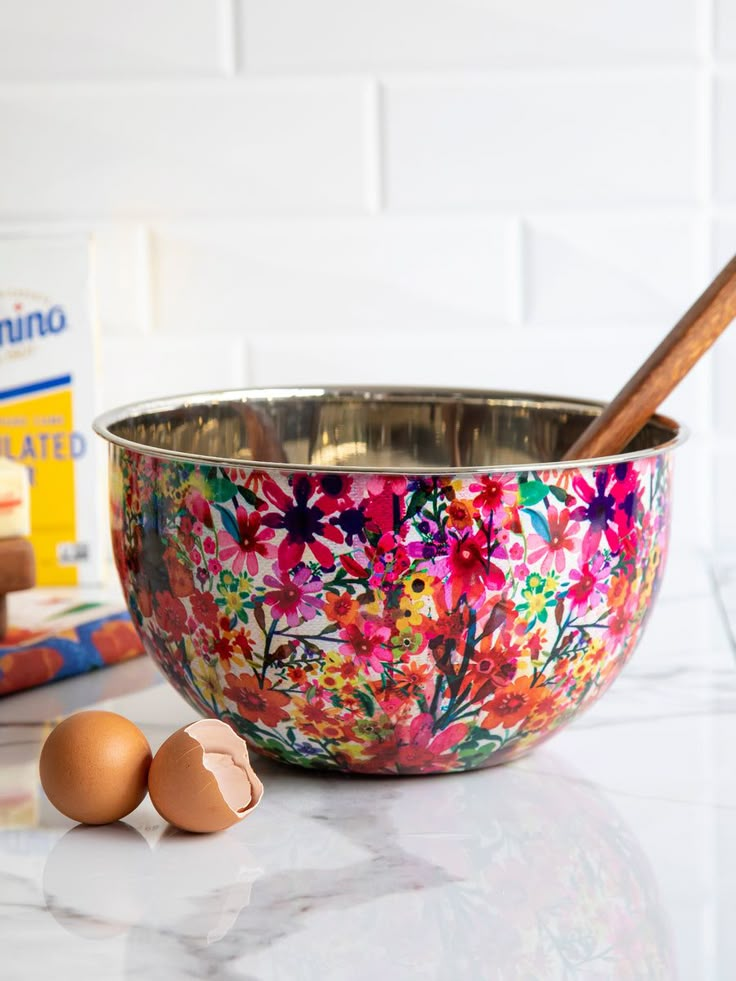 an image of a bowl and eggs on the counter with ingredients to make it look like they have been painted