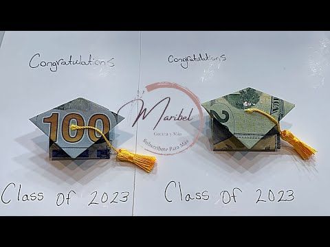 two origami graduation caps with tassels on them and the words class of 2013 written in cursive writing