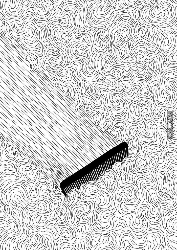 a black and white image of a hairbrush in the water with waves on it