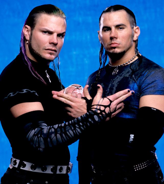 two male wrestlers posing for the camera