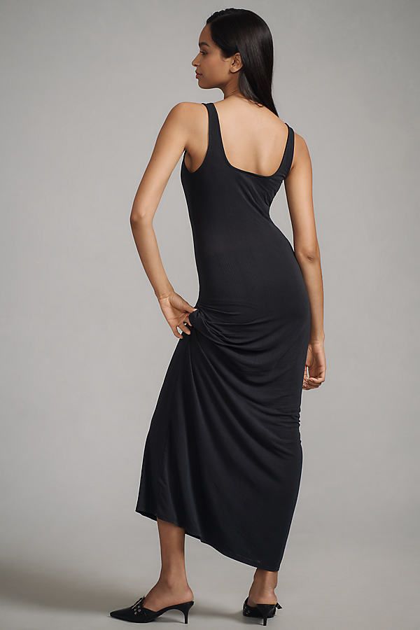 59% polyester, 32% viscose, 9% elastane Pullover styling Machine wash Imported | Knit Slip Dress by Anthropologie in Black, Women's, Size: XS, Polyester/Viscose/Elastane Stretch Viscose V-neck Midi Dress, Casual Scoop Neck Elastane Dresses, Casual Fitted Elastane Maxi Dress, Chic Stretch Midi Dress With Scoop Neck, Chic Stretch Modal Dresses, Spring Stretch Modal Dresses, Flattering Stretch Midi Dress, Fitted Ruched Maxi Dress In Viscose, Spring Dresses In Modal With Stretch