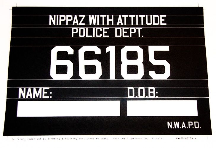 a black and white sign that says nipaz with attitude police dept 66165 dob