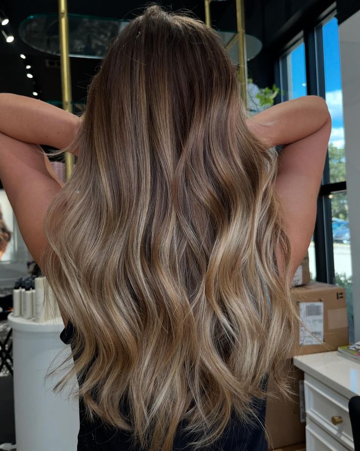 Happy National Balayage Week! 🎉 To celebrate, we’re excited to share some gorgeous photos highlighting the amazing balayage AND foilayage work of our talented stylists! Whether you’re after a subtle sun-kissed glow or a bold, dimensional look, our team can create the perfect balayage just for you! 🌟 Call OR text us at 225-328-4998 to book with our talented stylists! Take your confidence TO THE NEXT LEVEL! 🌟 #Balayage #Foliage #HandpaintedBalayage #HandpaintedColor #Hair #HairSalon #Hairsty... Sunlights Balayage Brunette, Balayage On Level 7, Brown Balayage Extensions, Level 7 Balayage, Balyage Long Hair Brunette To Blonde, Textured Balayage, Balayage Ponytail, Grown Out Balayage, Foilayage Hair