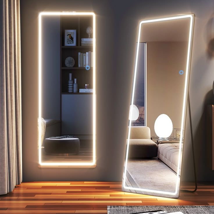 a large mirror sitting on top of a wooden floor next to a wall mounted shelf