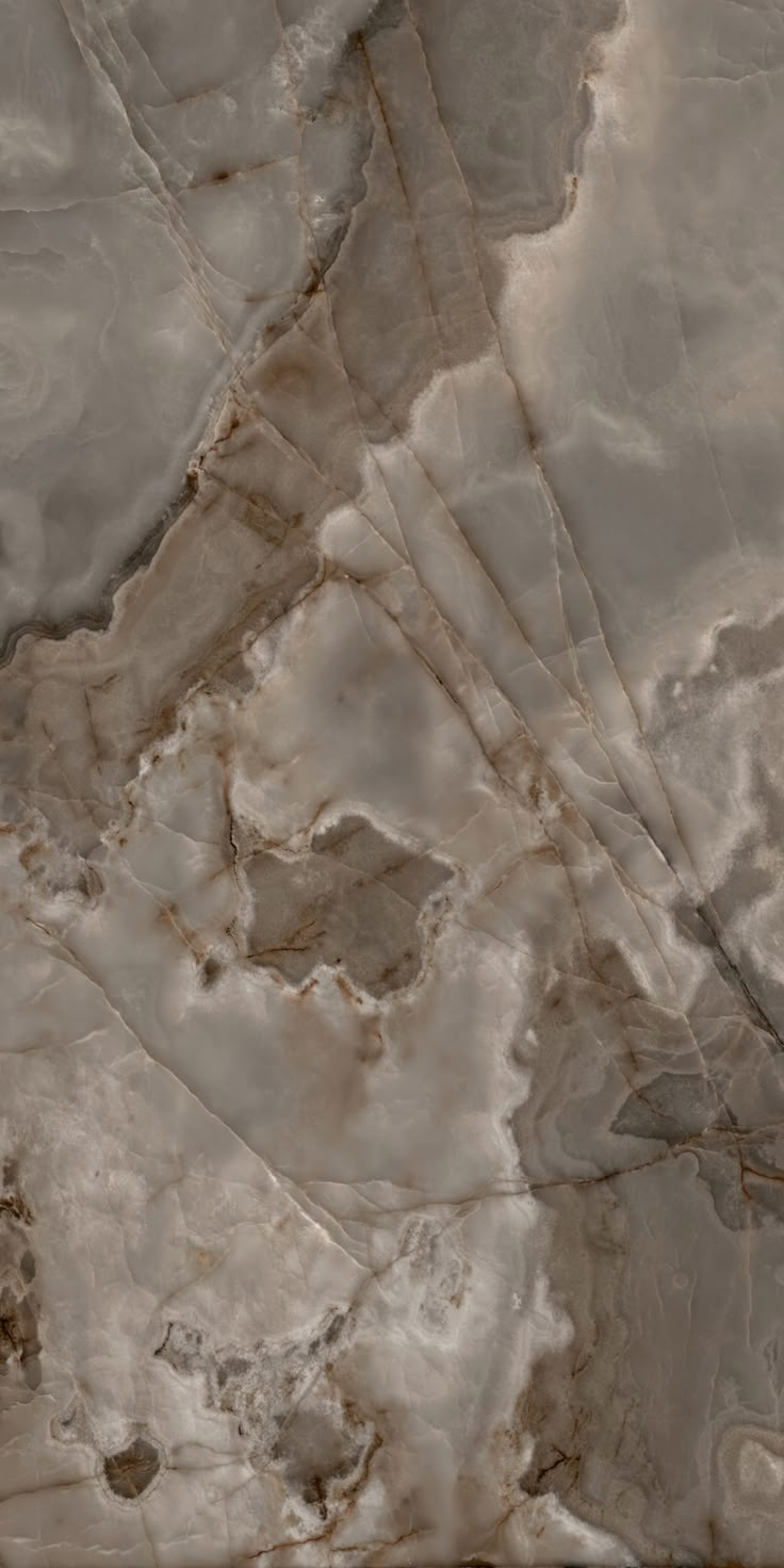 an abstract marble pattern with brown and white colors in the middle, as seen from above