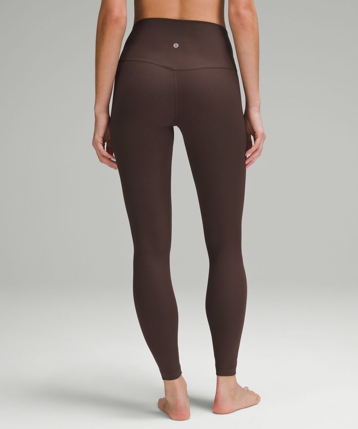 When feeling nothing is everything. Powered by Nulu fabric, this ribbed version of our lululemon Align pants feels weightless and buttery soft. Designed for Yoga. Full length intended to sit at ankle. Hidden waistband pocket fits a card or key, and won't get in your way. This collection's great for low-impact workouts like yoga or whenever you want to feel really, really comfortable. Brown Lululemon Leggings, Black Lulu Leggings, Lulu Lemon Pants, Lulu Lemon Leggings, Dark Brows, Lulu Leggings, Brown Leggings, Boo Basket, Fall Leggings