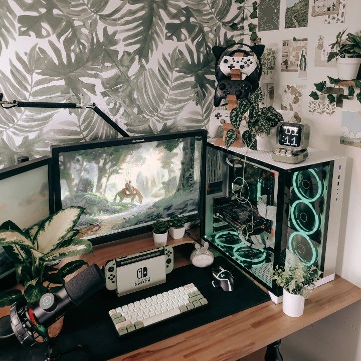 a desktop computer sitting on top of a wooden desk next to a monitor and keyboard