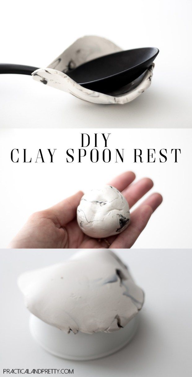 a hand holding a clay spoon rest in front of a white bowl with black lid