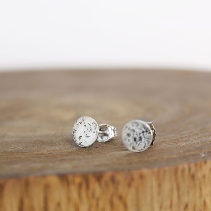 These small silver moon studs address the perfect addition for our Galaxy line. We wanted to add something fun and easy to the Fall Line this year. Features & Measurements: 🌘 Sterling silver moons measure 6mm round 🌘 Sterling silver backs 🌘 Hand textured Pure Impressions makes these stunning moon earrings, as well as other hand made jewelry with love one at a time in the heart of Wyoming. Silver Moon Earrings, Moon Phase Ring, Coffee Earring, Mountain Earrings, Galaxy Earrings, Our Galaxy, Malachite Earrings, Kids Rings, Stamped Bracelet