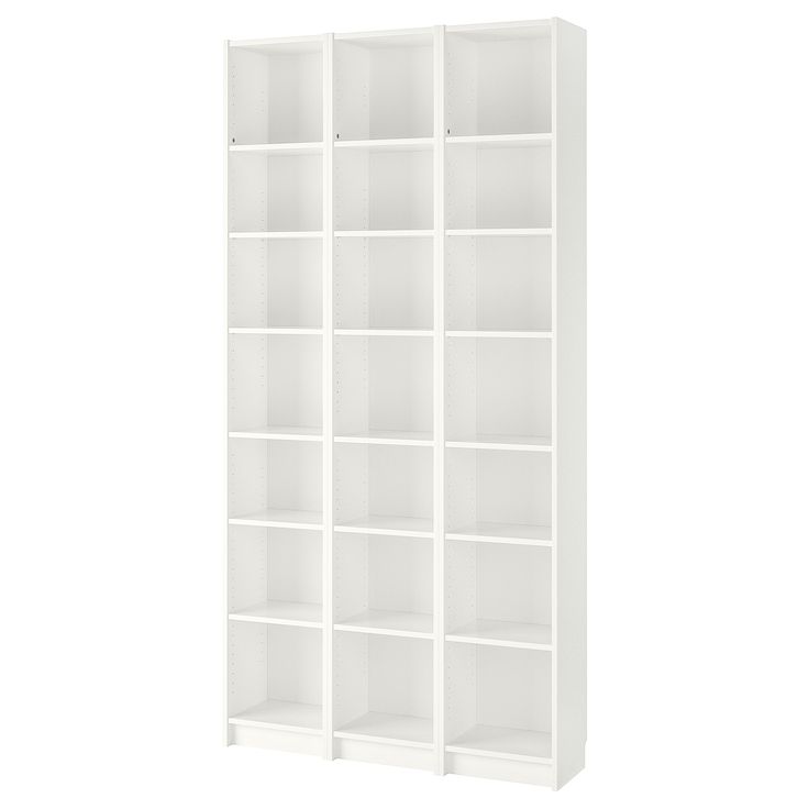 a white bookcase with six shelves on each side