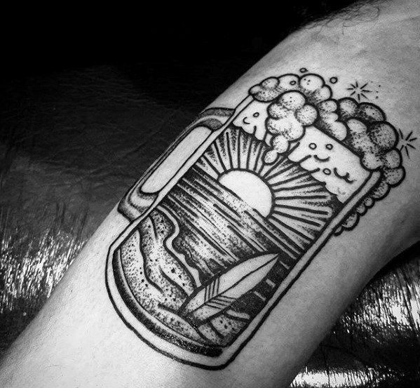 a black and white photo of a beer glass tattoo