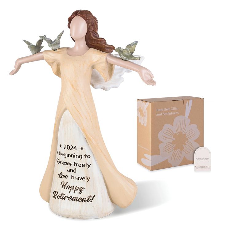 a figurine is next to a gift box