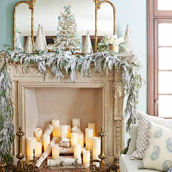 a living room decorated for christmas with candles