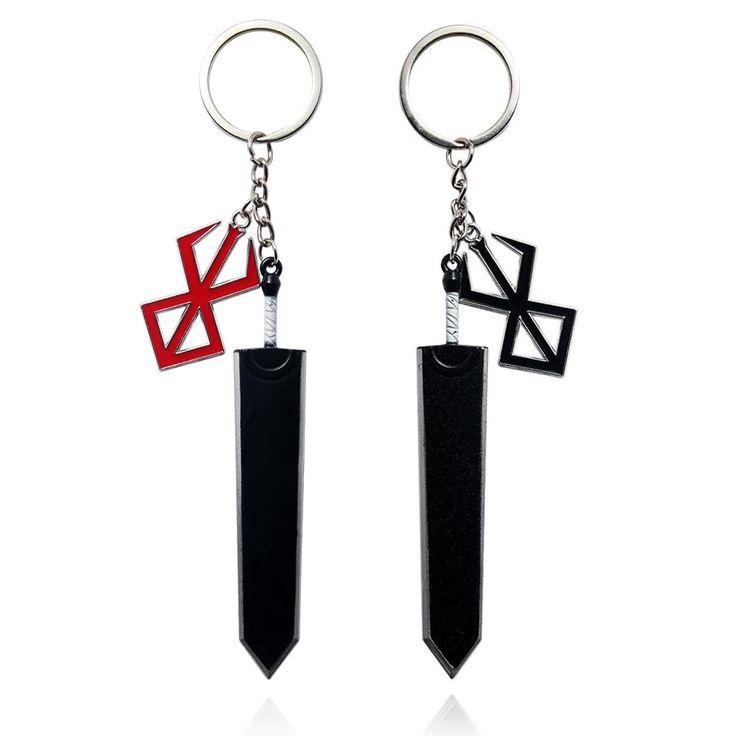 two black and red metal key chains with crosses on each one, both hanging from the same