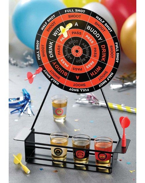 a dart board with shots in it and confetti on the table