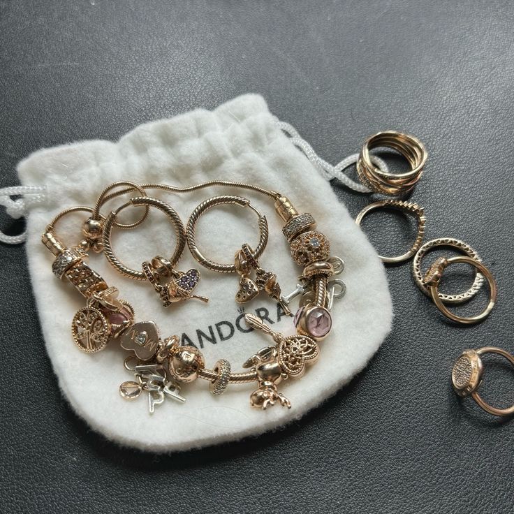 Entire Pandora Rose Gold Collection I Selling My Personal Rose Gold Pandora Collection I’m No Wear Anymore Rose Gold Jewelry 1 Full Pandora Charm Bracelet 1 Pair Of Hoops Charms With Charms 5 Rings Size 50, 54 And 1 Size 56 All Authentic All In Excellent Good Condition I Took Great Care Of This Collection, It Was Used On Few Occasions For Events, There Is A Lot Of Money In This Collection, Each Charm Is Around $100 Or More No Sell For Separate Sorry Rose Gold Pandora, Gold Pandora, Pandora Rose Gold, Pandora Collection, Pandora Rose, Hoop Charms, 5 Rings, Pandora Charm, Black Aesthetic Wallpaper