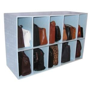 a wooden shelf filled with lots of purses