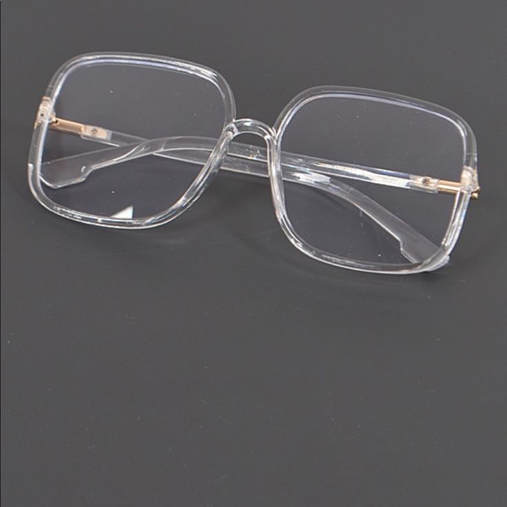 New Must-Haves!! Oversized Clear Frame Fashion Glasses With Gold Hardware. Blue Light Blocking Glasses Comes With A Black Microfiber Glasses Pouch. Cheap Clear Sunglasses With Metal Frame, Big Clear Glasses, Square Clear Glasses, Big Glasses Frames, Clear Frame Glasses, Clear Glasses Frames Women, Oversized Glasses Frames, 70s Glasses, Aesthetic Glasses