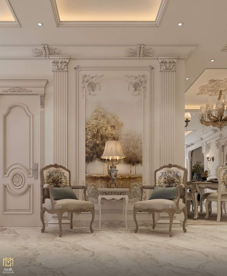 a living room filled with furniture and a chandelier