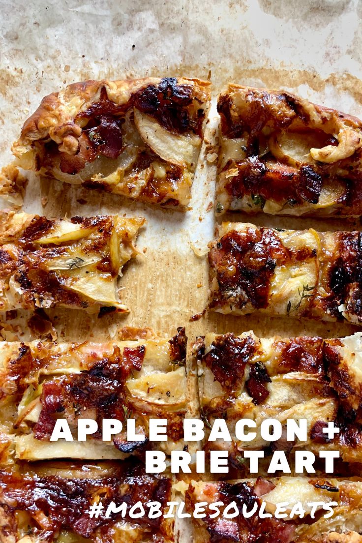 an apple bacon and brie tart pizza cut into eight slices