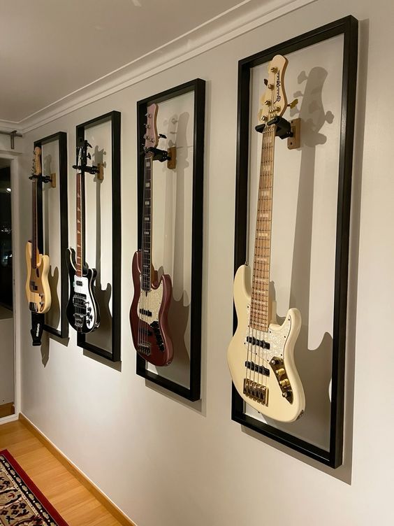 guitar room Music Aesthetic Home Decor, Wall With Guitars, Decorating With Guitars Living Rooms, Bedroom With Guitar On Wall, Living Room With Guitars On Wall, Guitar Room Setup, Framed Guitars On Wall, Guitar Hung On Wall, Music Room Guitar