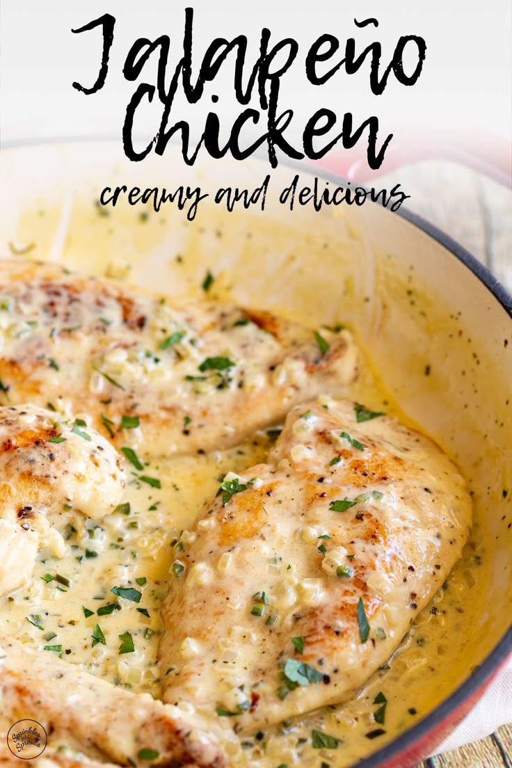 chicken with gravy and lemon sauce in a skillet on a wooden table