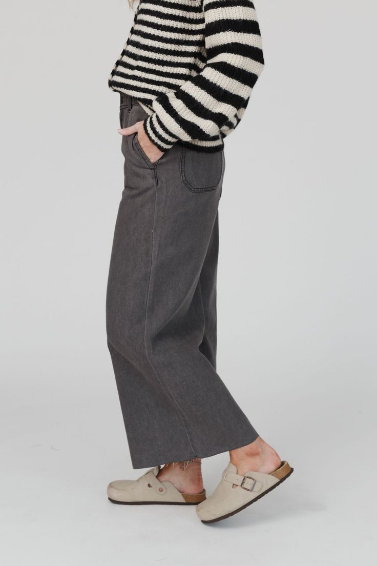 Elevate your casual boho style with our Simply You Wide Leg Jeans - with their trendy wide legs and comfortable fit, you'll feel stylish and confident in any setting! These jeans will become a staple in your boho wardrobe because they feature: Washed denim fabric Relaxed, loose fit for a laid-back look Wide leg silhouette with raw edges for added boho style Side and back patch pockets Classic button and zip fly Elasticized waistband ensures a comfortable fit Go-to boho outfit pair with: Eye Of T Chic Wide Leg Flare Jeans In Washed Black, Chic Wide Leg Washed Black Flare Jeans, Casual Mid-rise Wide Leg Pants With Frayed Hem, Washed Black Relaxed Fit Cotton Flare Jeans, Washed Black Cotton Flare Jeans Relaxed Fit, Frayed Hem Cropped Wide Leg Pants For Fall, Fall Relaxed Fit Pants With Frayed Hem, Cropped Wide Leg Pants With Frayed Hem For Fall, Casual Full Length Bottoms With Frayed Hem