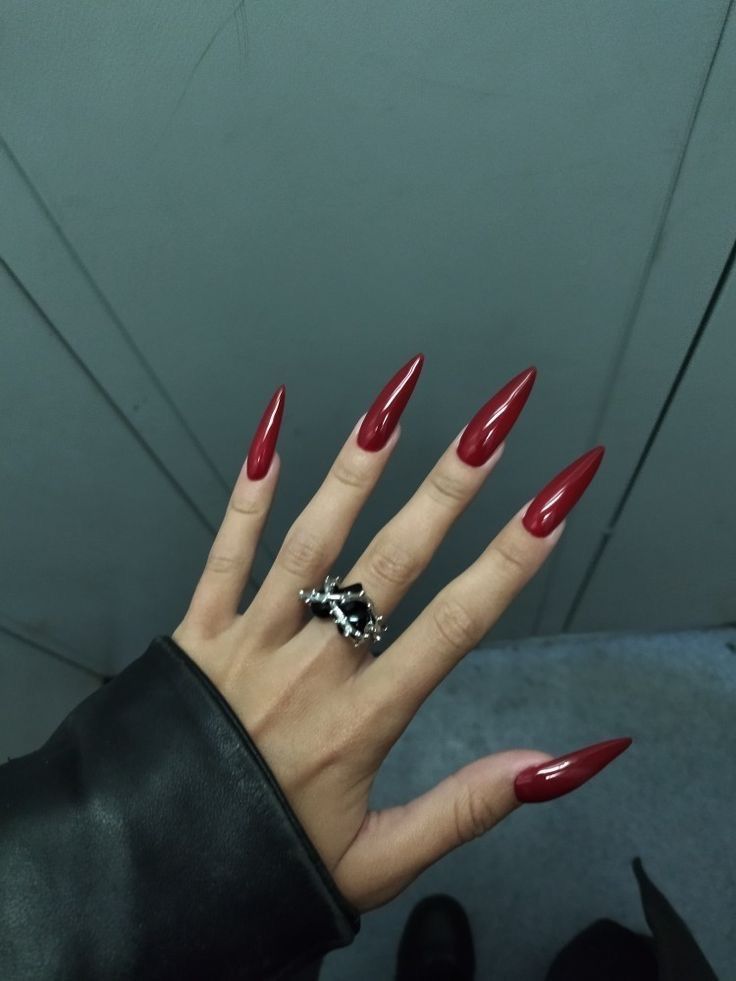 Long Red Nails Aesthetic, Stilleto Red Nails Designs, Medium Stilleto Nails Red, Pointy Red Acrylic Nails, Pointed Red Nails, Deep Red Stiletto Nails, Wine Red Stiletto Nails, Long Almond Red Nails, Red Jelly Stiletto Nails